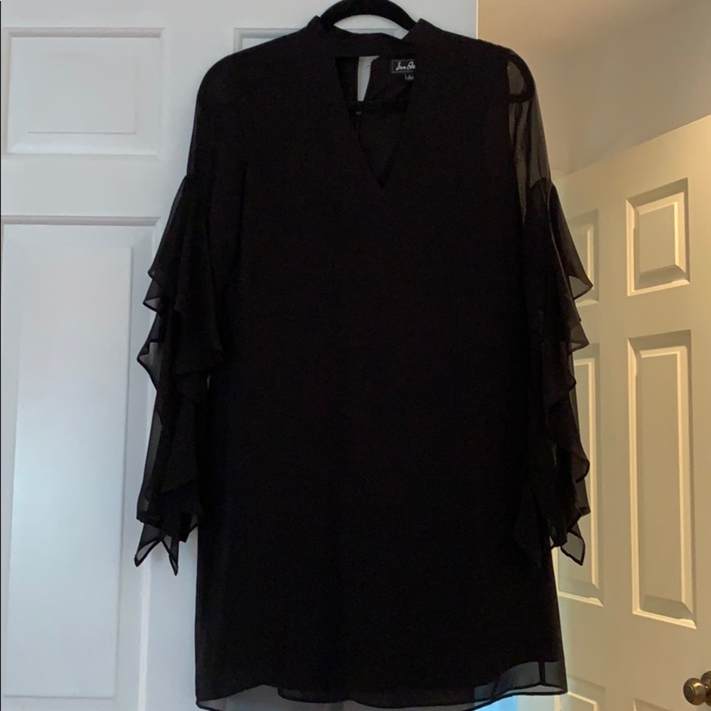 Black shift dress with ruffle sleeves